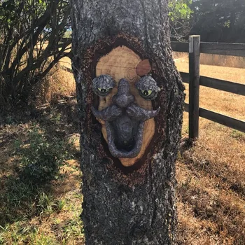 Drzewo twarzy wystrój odkryty, stary dziki ptak karmnik drzewo przytulas posągi w oczach ogród wystrój dziedziniec sztuki