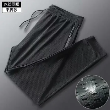 Wysokiej jakości casual spodnie mężczyźni letnie fajne spodnie sportowe Męskie spodnie oddychające, elastyczne plus rozmiar 5XL czarne spodnie fajne HX365